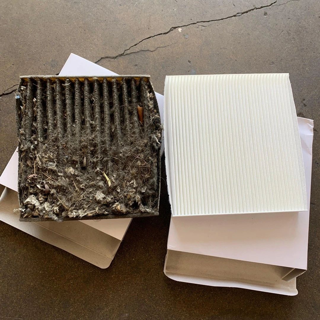 Side by side comparison of cabin air filters - dirty and new