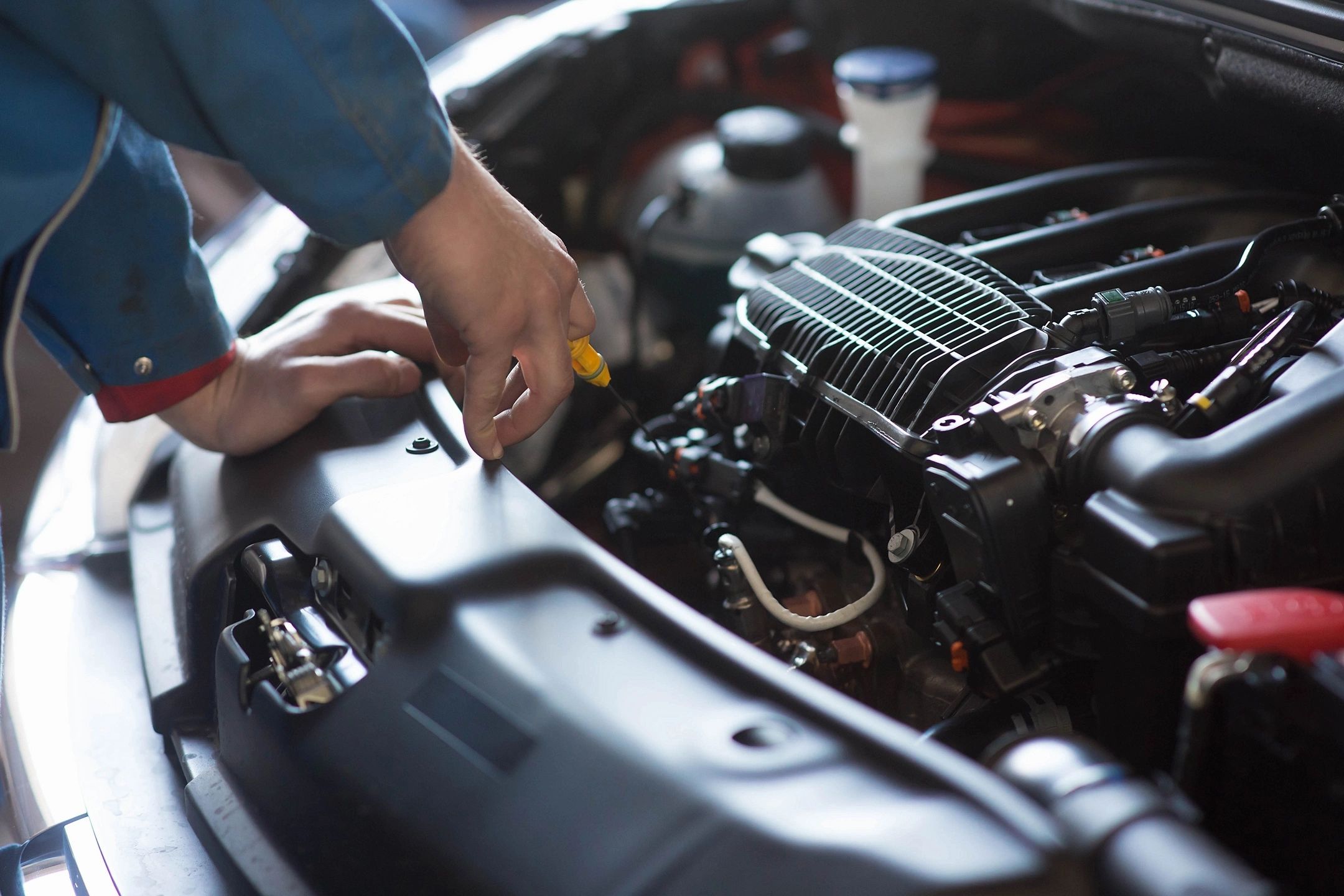 Person checking oil level
